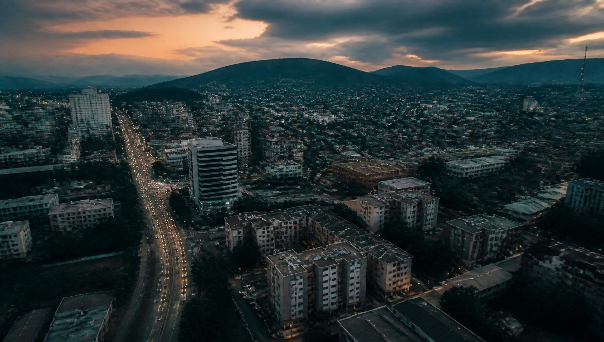 Aerial view of a growing city at dusk